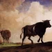 Taureau avançant dans un paysage pastoral, illustrant le signe du Taureau et sa dimension terrestre en astrologie.