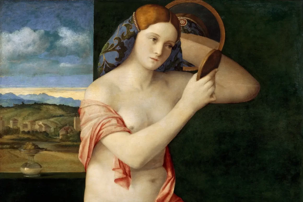 Jeune femme nue observant son reflet dans un miroir, tableau de Giovanni Bellini illustrant l’introspection et la connaissance de soi.